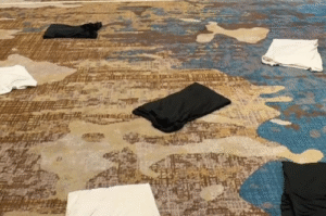 Coworkers and Mentalist Help Idaho Man Break T-Shirt Folding World Record
