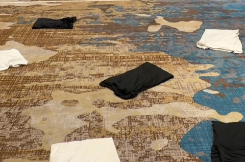 Coworkers and Mentalist Help Idaho Man Break T-Shirt Folding World Record